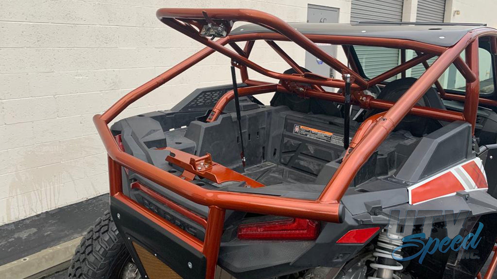 Opening Spare Tire Mount with shocks for the Polaris RZR 1000 by UTV Speed