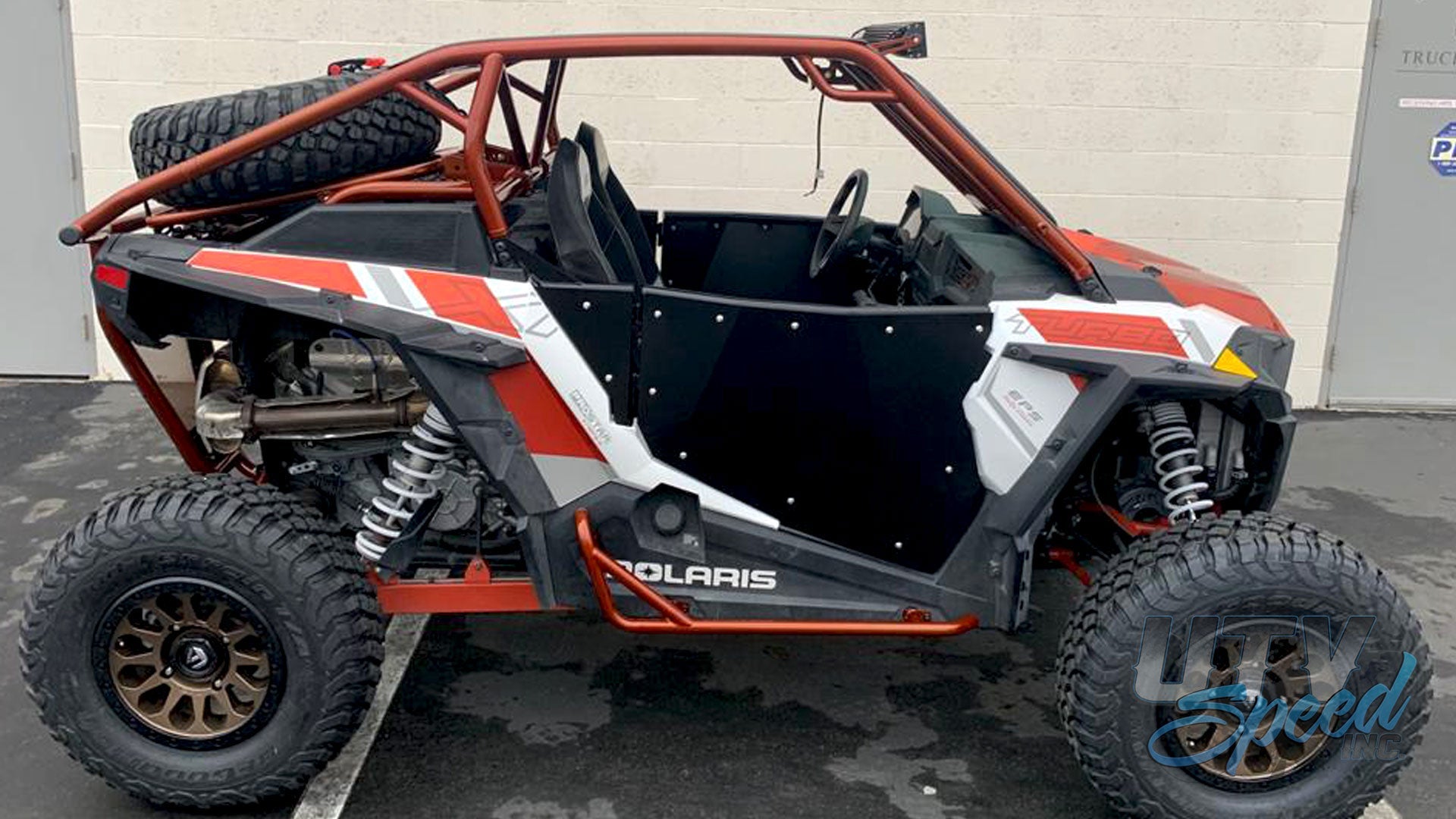 Opening Spare Tire Mount with shocks for the Polaris RZR 1000 by UTV Speed