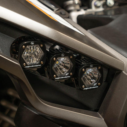 Close-up of vehicle headlights with &